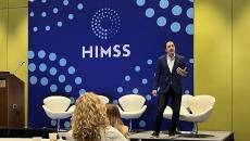 Aaron Miri, senior vice president and chief digital and information officer at Baptist Health on stage at HIMSS23