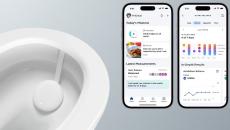 Withings app on two phones and a toilet bowl